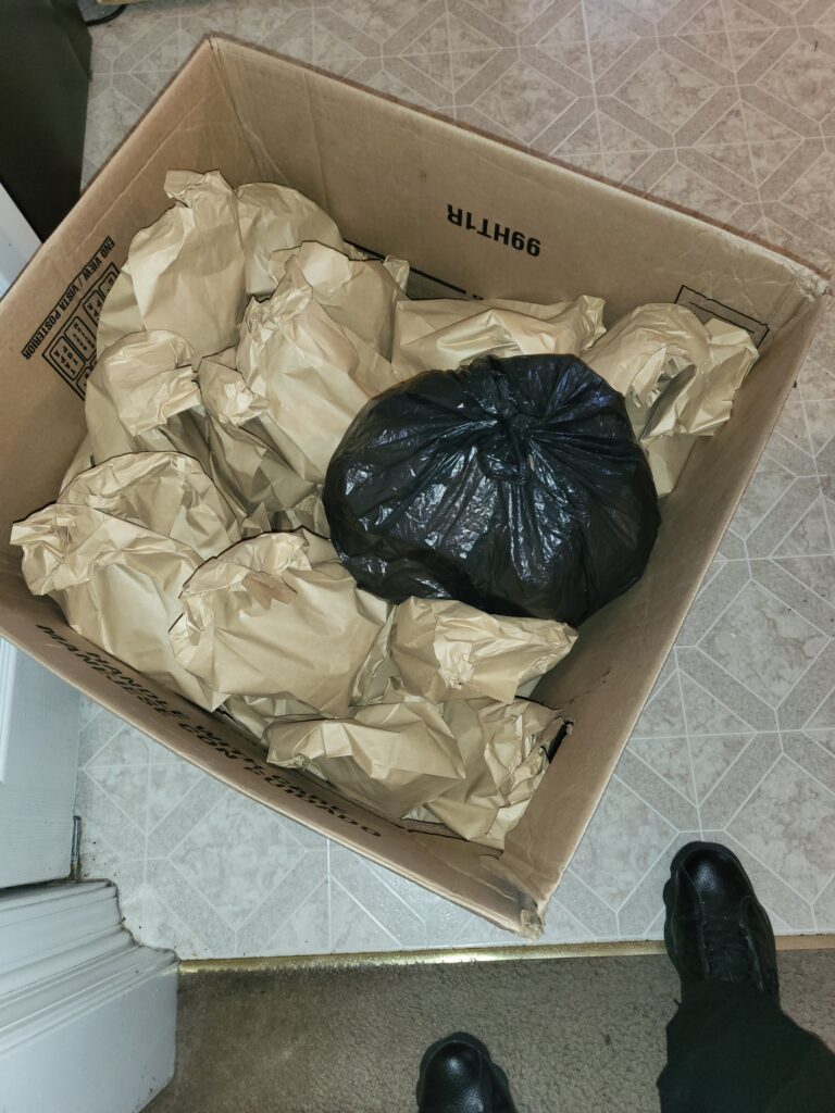 Prepared food bags packed by King of Judah Outreach for community distribution.